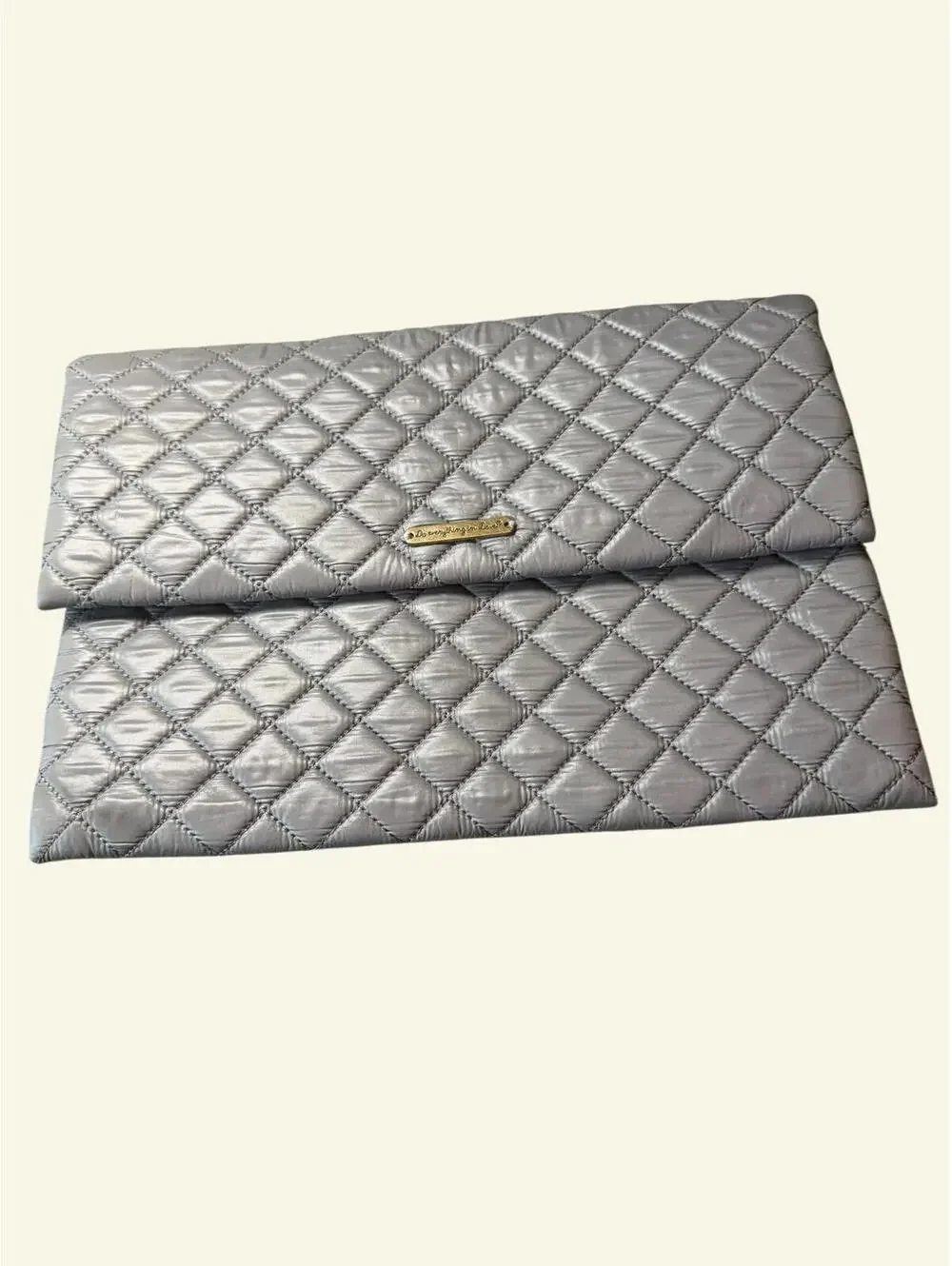 Do everything in Love Quilted Silver Clutch Purse